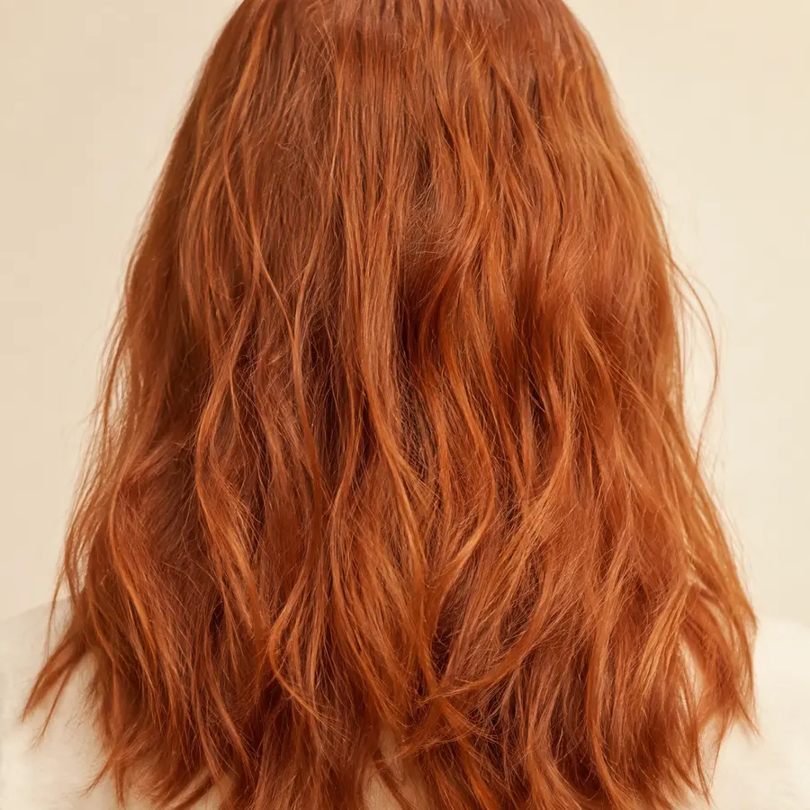 Illustrative before view of dry color-treated copper hair