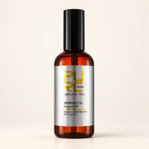 PURC Moroccan Argan Hair Oil bottle on a warm ivory background