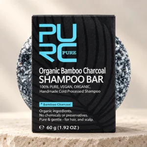 PURC Organic Bamboo Charcoal Shampoo Bar 60g with black box and round charcoal bar
