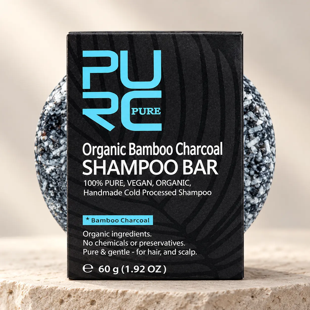 PURC Organic Bamboo Charcoal Shampoo Bar 60g with black box and round charcoal bar