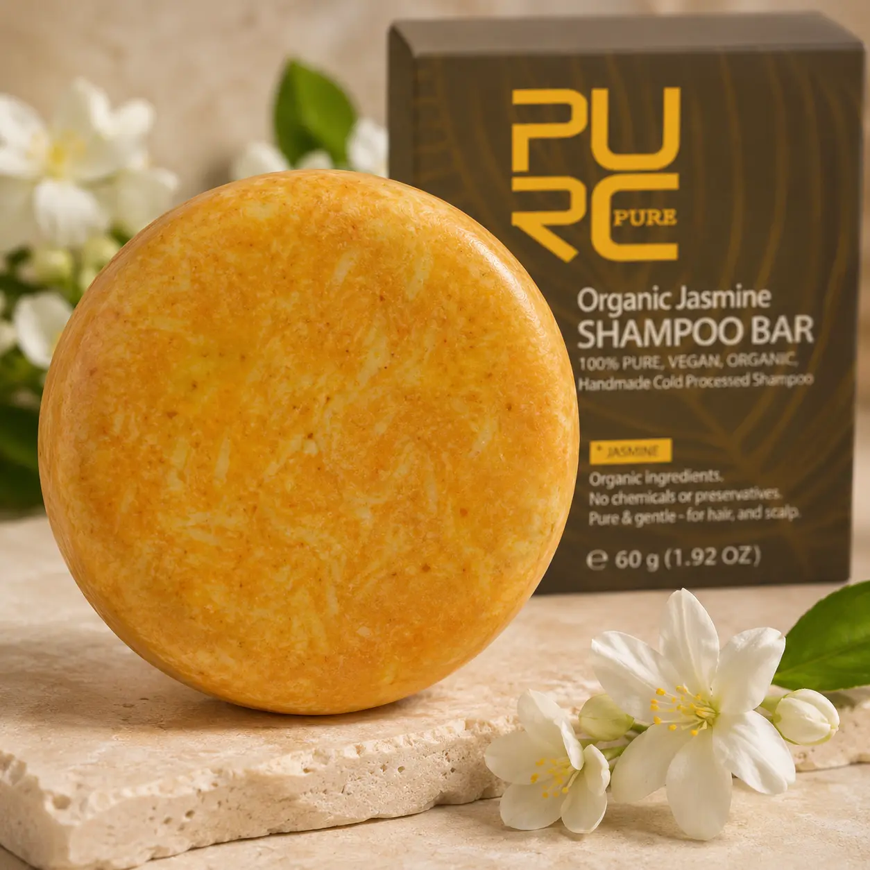 Close-up showing PURC Jasmine Shampoo Bar texture and jasmine flowers