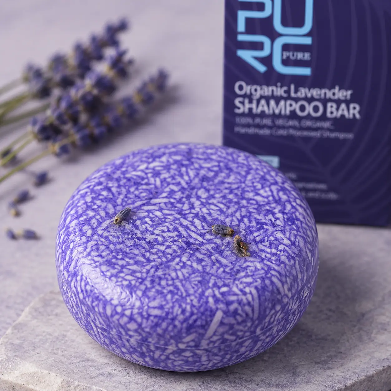 Close-up angle showing PURC Lavender Shampoo Bar texture