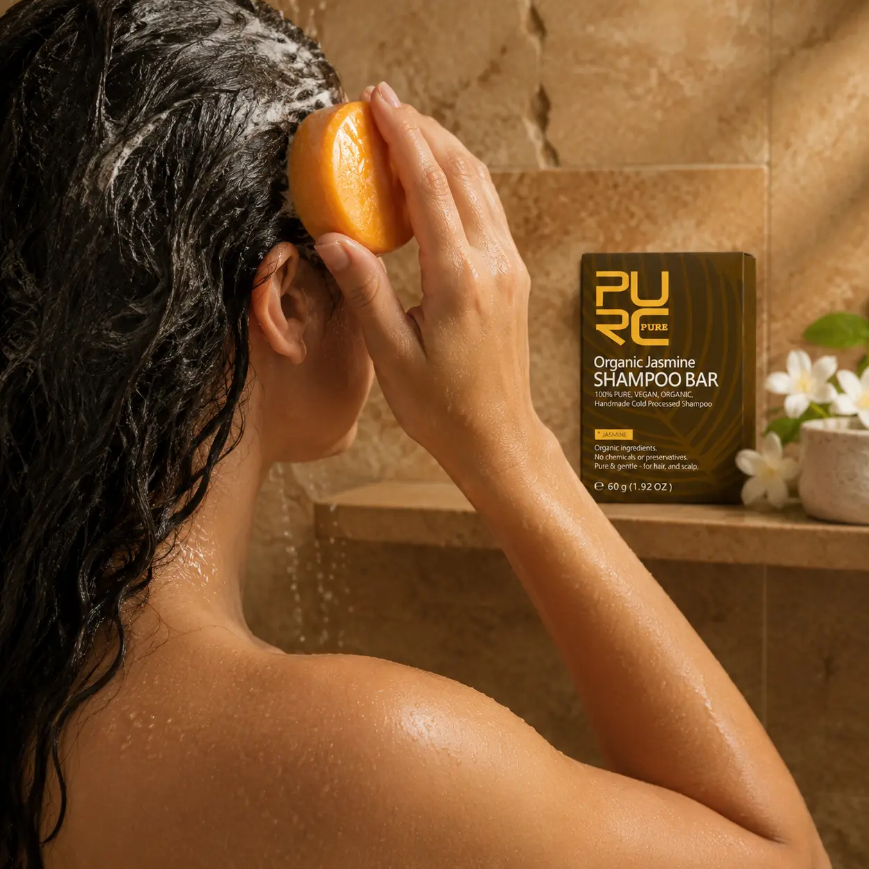 Woman applying PURC Jasmine Shampoo Bar to wet hair