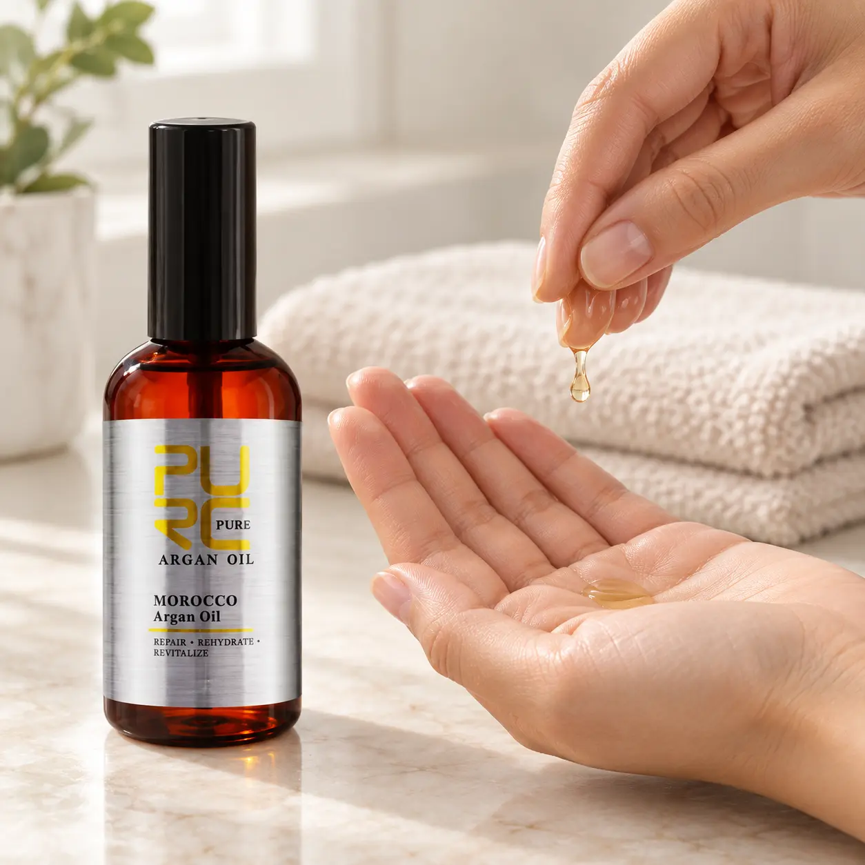 Hand dispensing a small amount of PURC Moroccan Argan Hair Oil into a palm