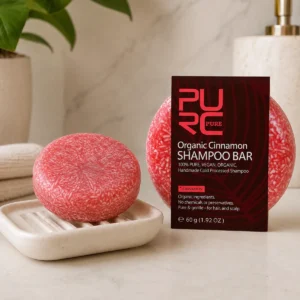 PURC Cinnamon shampoo bar on draining soap dish
