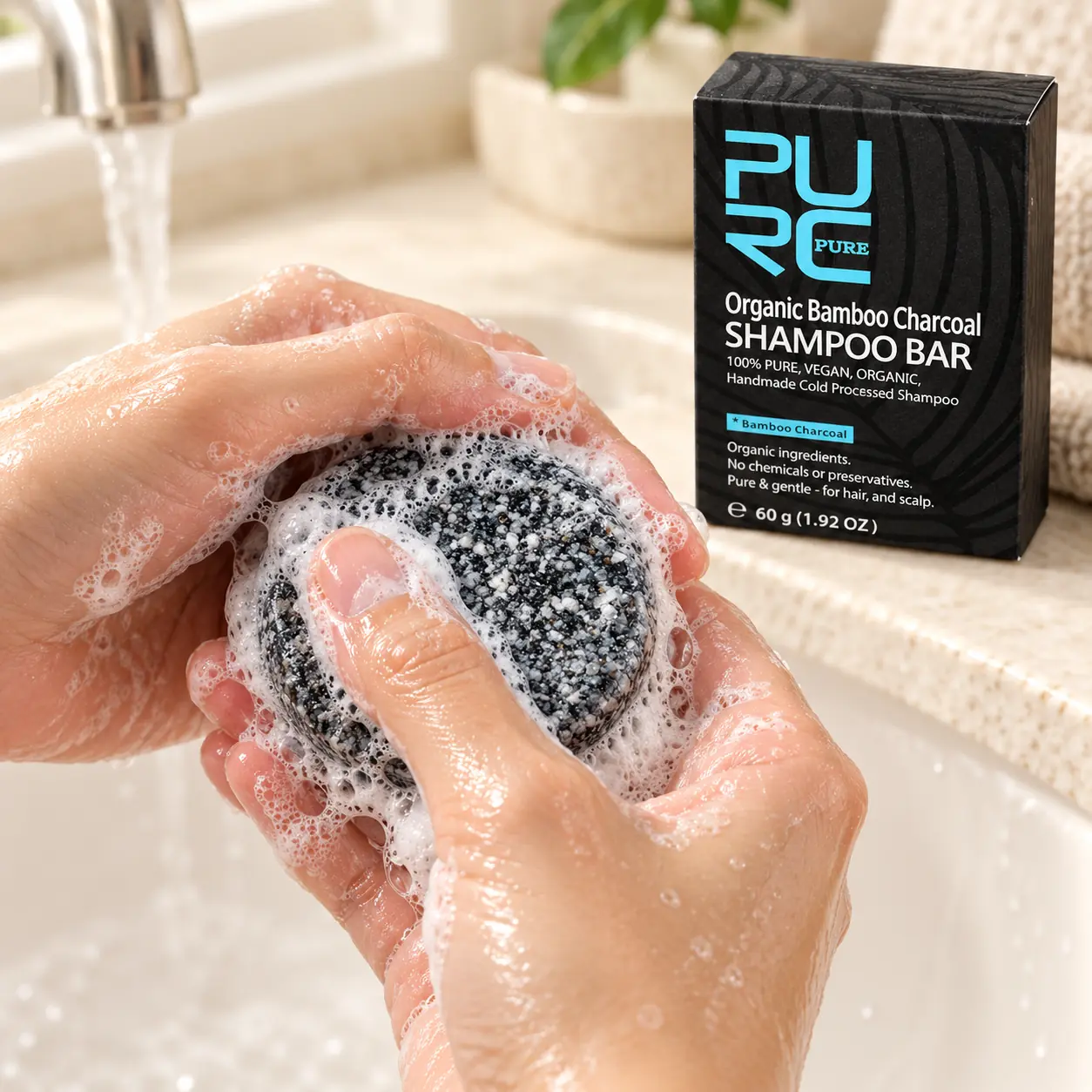 PURC Bamboo Charcoal Shampoo Bar creating a creamy lather between wet hands