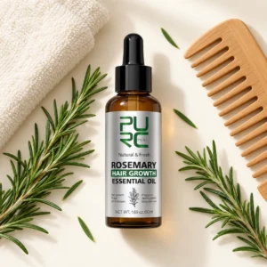 PURC Rosemary Hair Growth Essential Oil flat lay with rosemary, towel and wooden comb