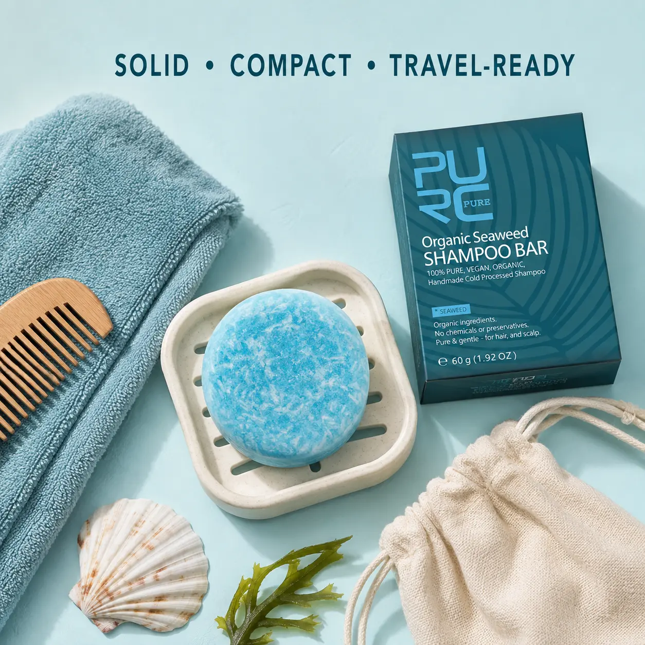 PURC Bio Seaweed Shampoo Bar with a soap dish, towel, wooden comb and travel pouch